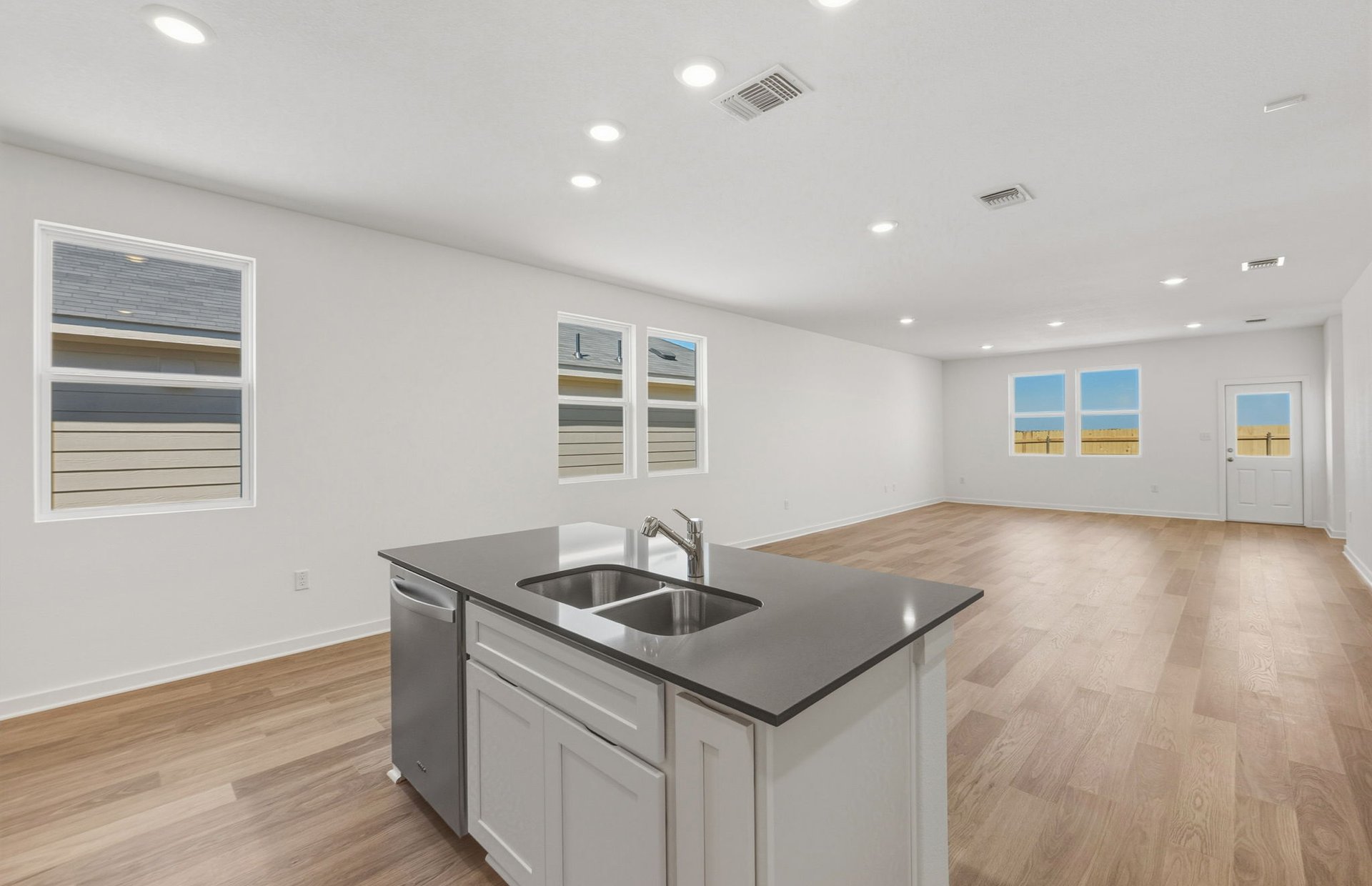 104 Eagle Valley Drive Elgin, TX 78621 - Photo 4 of 18 a kitchen with sink and window