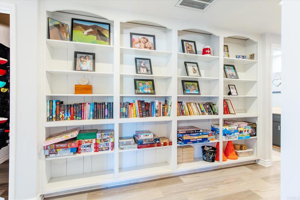 24093 Sargeant Road Ramona, CA 92065 - Photo 15 of 57 a room with toys and a book shelf