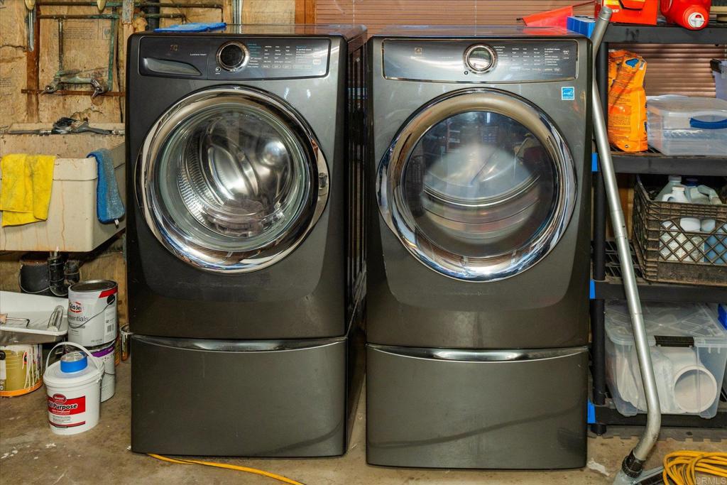 24093 Sargeant Road Ramona, CA 92065 - Photo 31 of 57 a close up view of a washer and dryer
