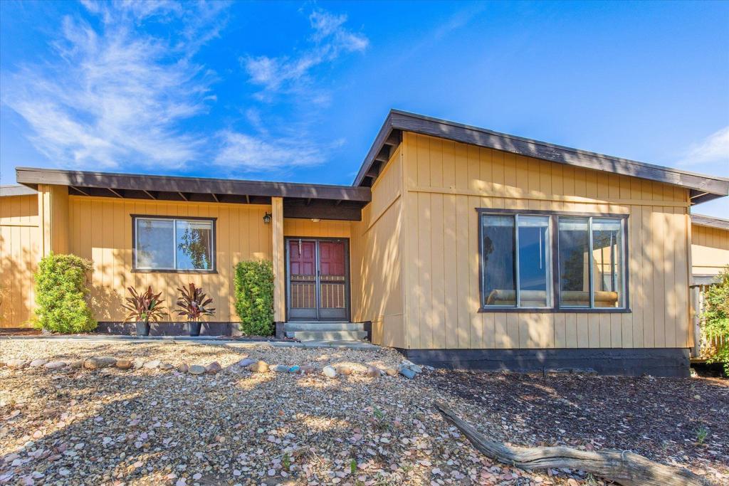 24093 Sargeant Road Ramona, CA 92065 - Photo 32 of 57 a front view of a house with garden