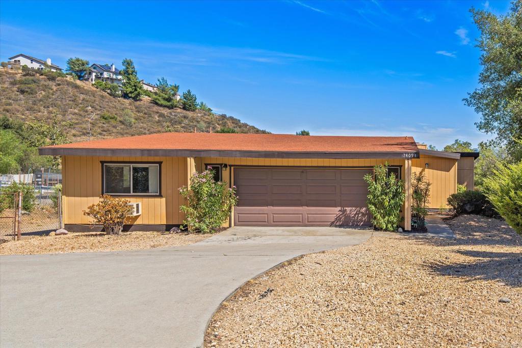 24093 Sargeant Road Ramona, CA 92065 - Photo 35 of 57 front view of a house with a outdoor space