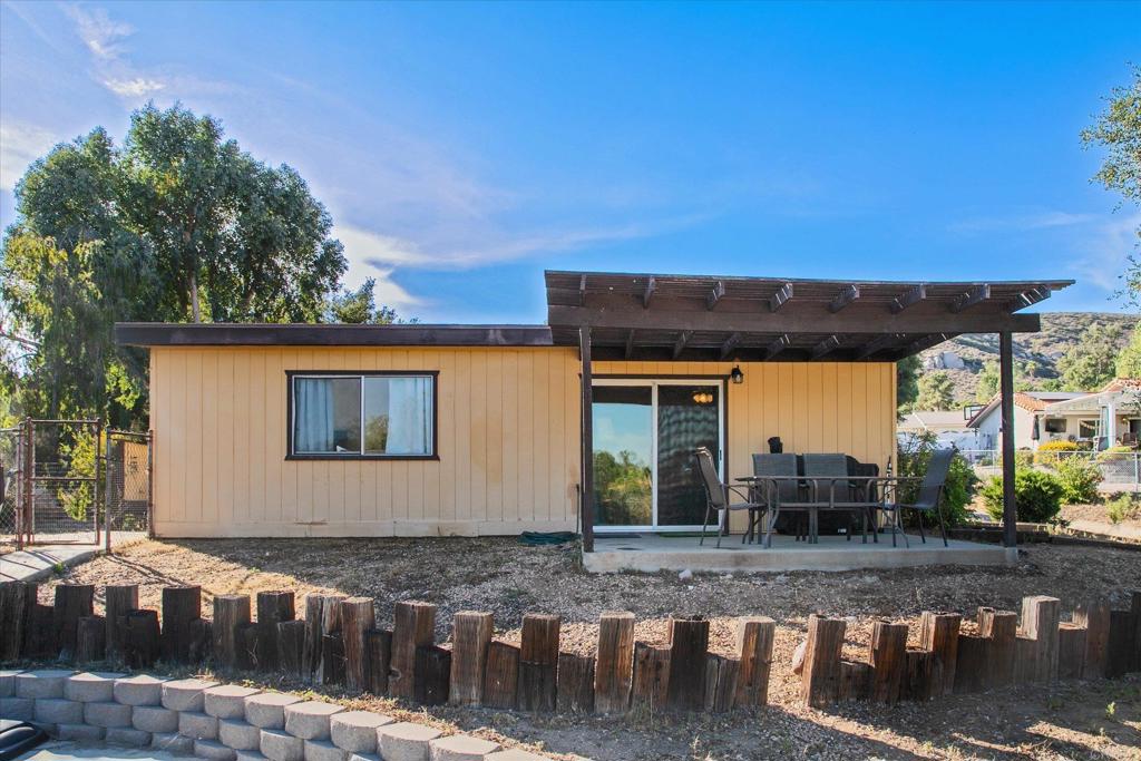 24093 Sargeant Road Ramona, CA 92065 - Photo 46 of 57 a view of a house with garden