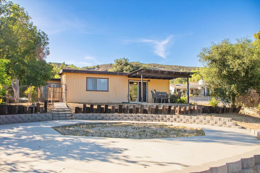 24093 Sargeant Road Ramona, CA 92065 - Photo 48 of 57 a front view of a house