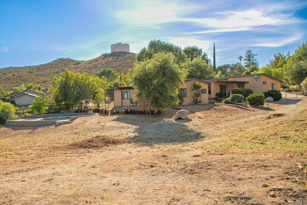 24093 Sargeant Road Ramona, CA 92065 - Photo 49 of 57 a view of a road with a building in the background