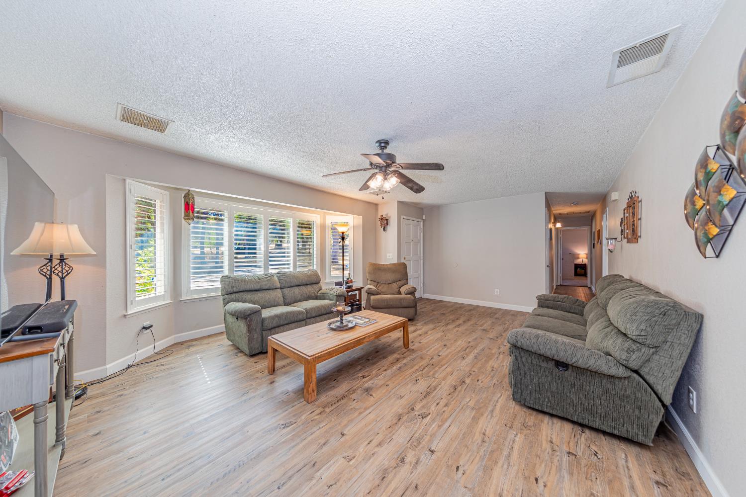 47165 Modoc Road Coarsegold, CA 93614 - Photo 11 of 33 a living room with furniture and a large window