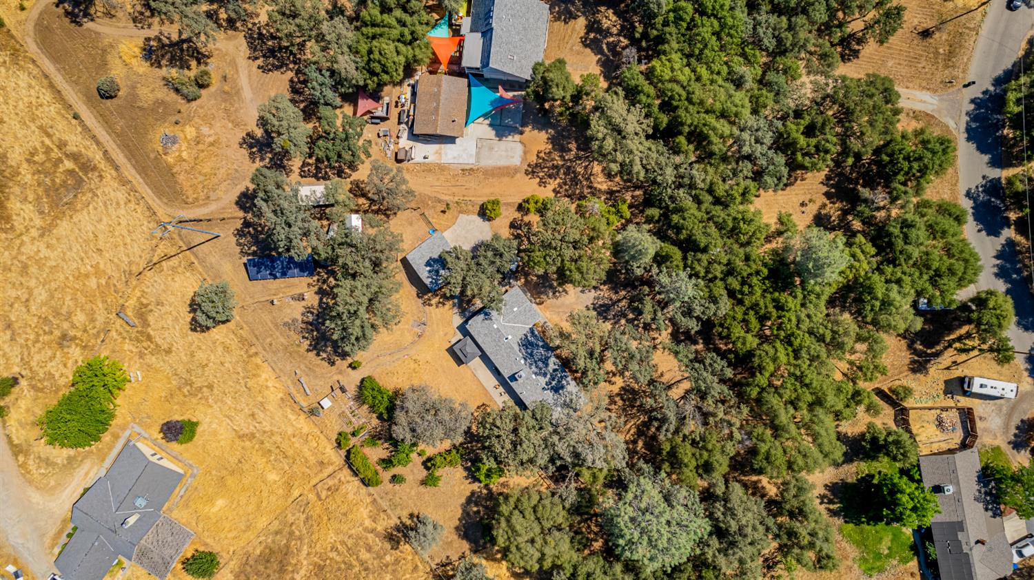 47165 Modoc Road Coarsegold, CA 93614 - Photo 29 of 33 a view of outside house with swimming pool