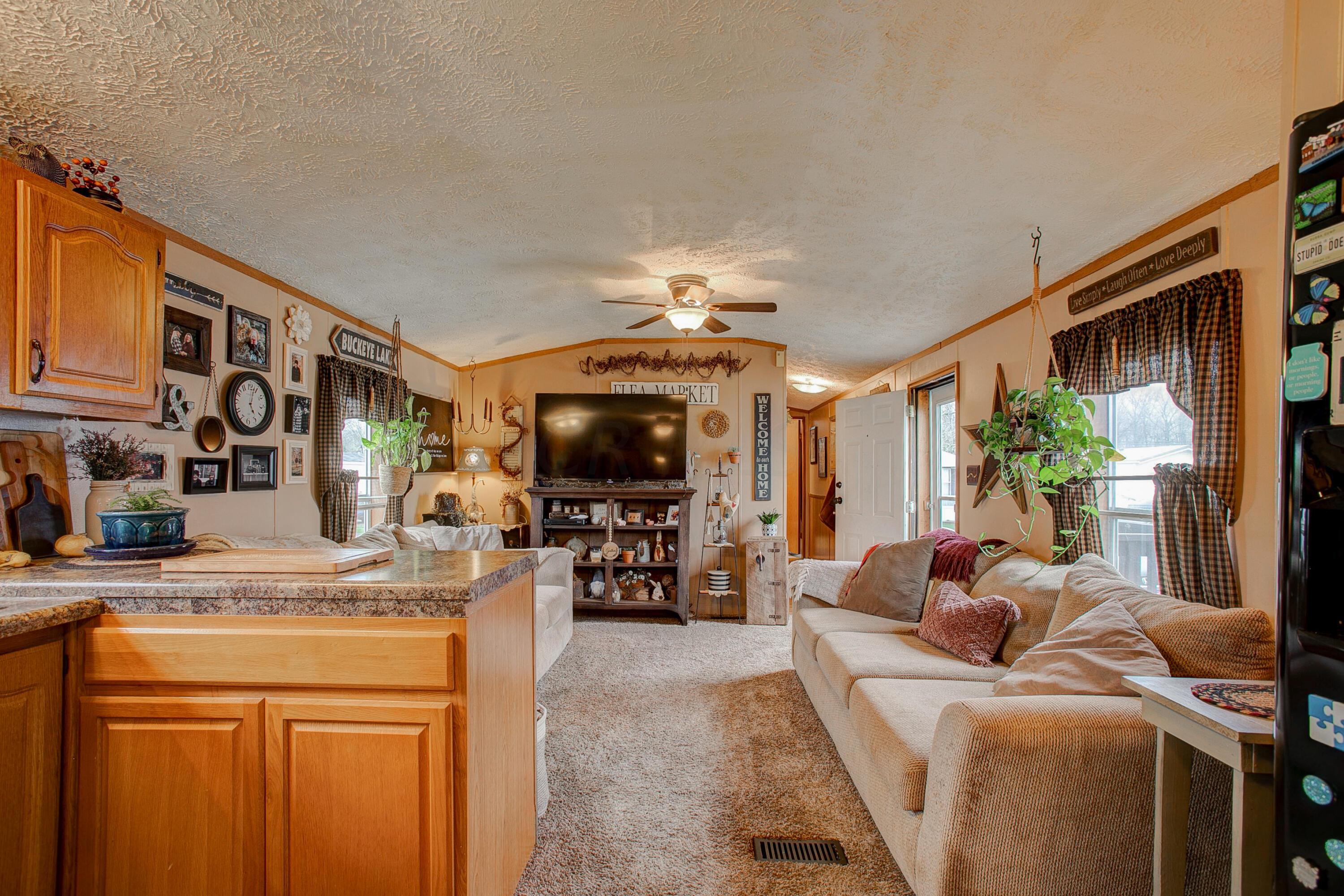 4711 Walnut Road, Unit L26 Buckeye Lake, OH 43008 - Photo 16 of 22 Kitchen to Living Room