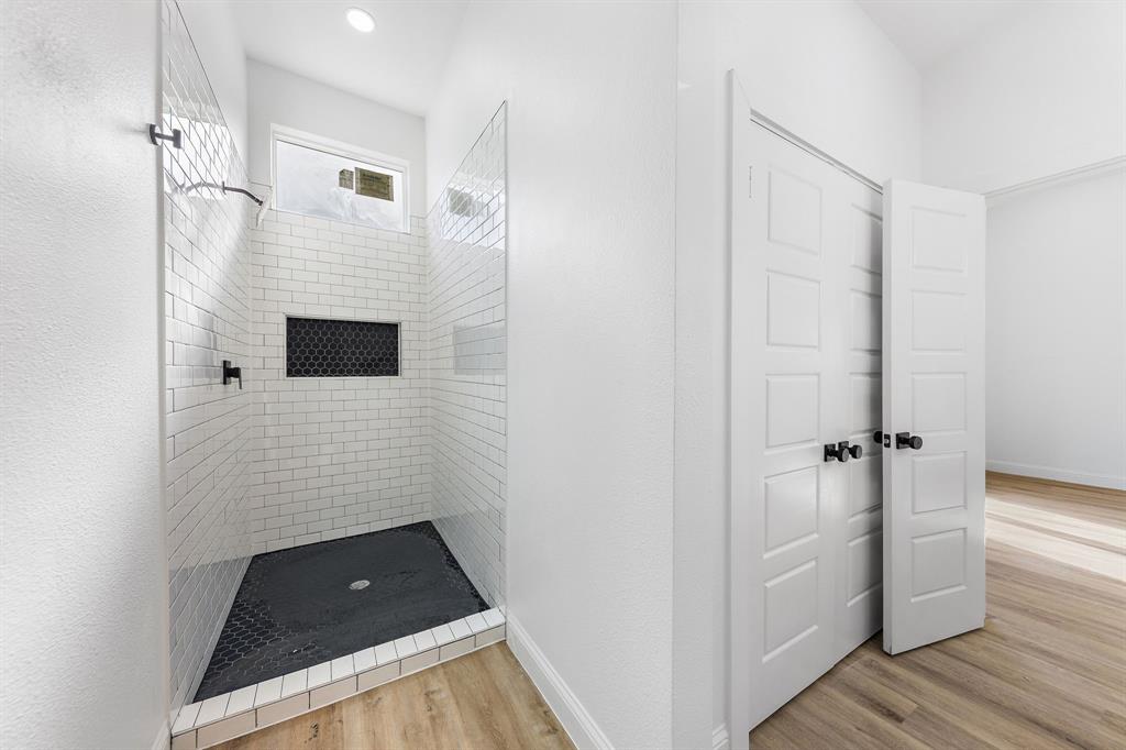 1247 Bonham Street Paris, TX 75460 - Photo 10 of 18 a view of bathroom with a sink and shower