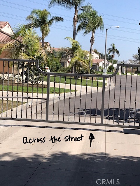 16239 Chicago Avenue Bellflower, CA 90706 - Photo 2 of 30 a view of a swimming pool with a bench