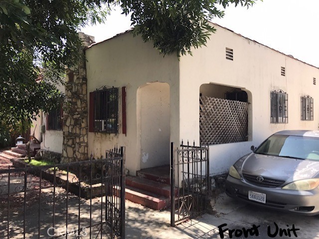 16239 Chicago Avenue Bellflower, CA 90706 - Photo 27 of 30 a backyard of a house with outdoor seating