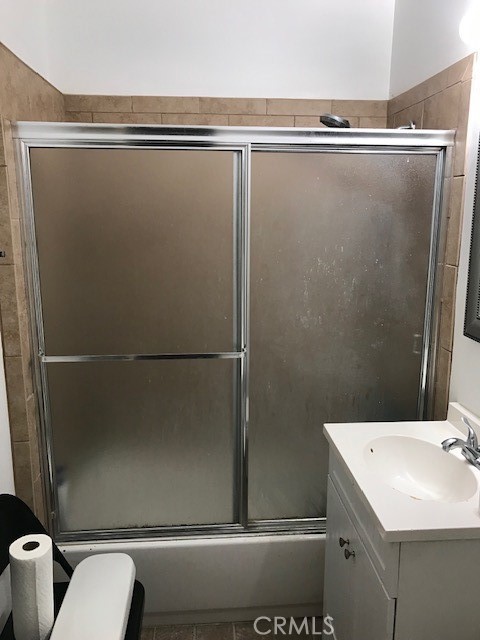 16239 Chicago Avenue Bellflower, CA 90706 - Photo 30 of 30 a bathroom with a shower and a sink