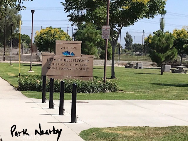16239 Chicago Avenue Bellflower, CA 90706 - Photo 3 of 30 a sign on the side of a building