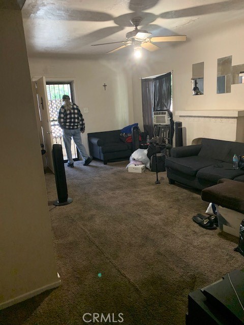 16239 Chicago Avenue Bellflower, CA 90706 - Photo 4 of 30 a living room with furniture