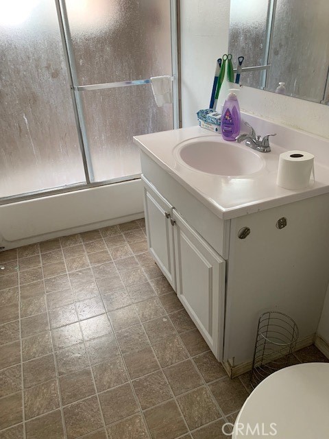 16239 Chicago Avenue Bellflower, CA 90706 - Photo 7 of 30 a bathroom with a sink a toilet and shower