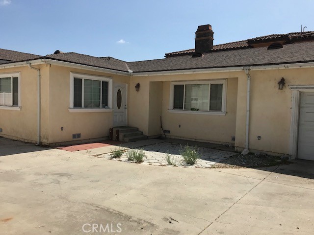 16239 Chicago Avenue Bellflower, CA 90706 - Photo 10 of 30 a front view of a house
