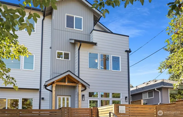 a view of a house with a street