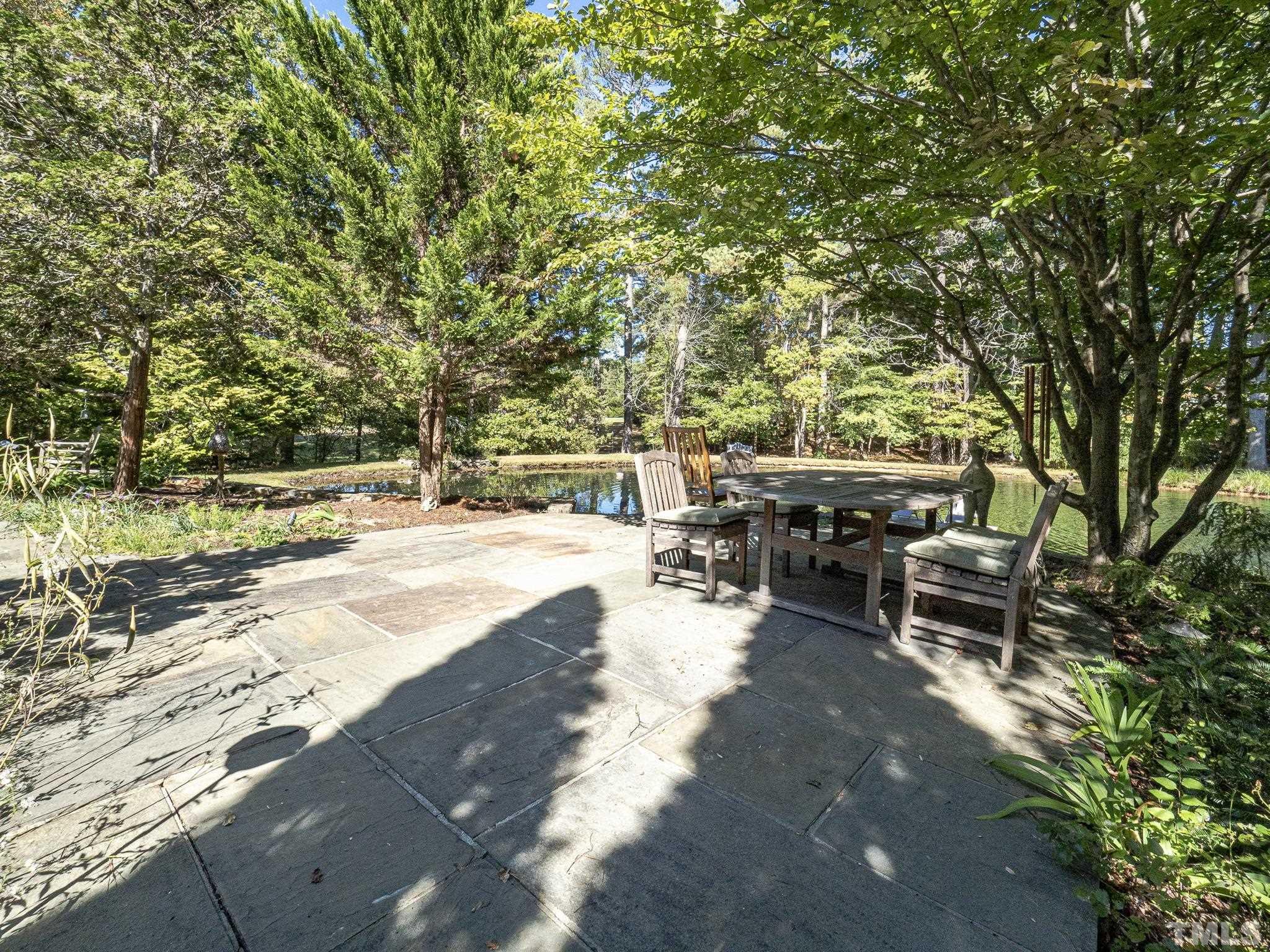 3916 Cole Mill Road Durham, NC 27712 - Photo 24 of 30 Ample patio space overlooking beautiful pond & pool!