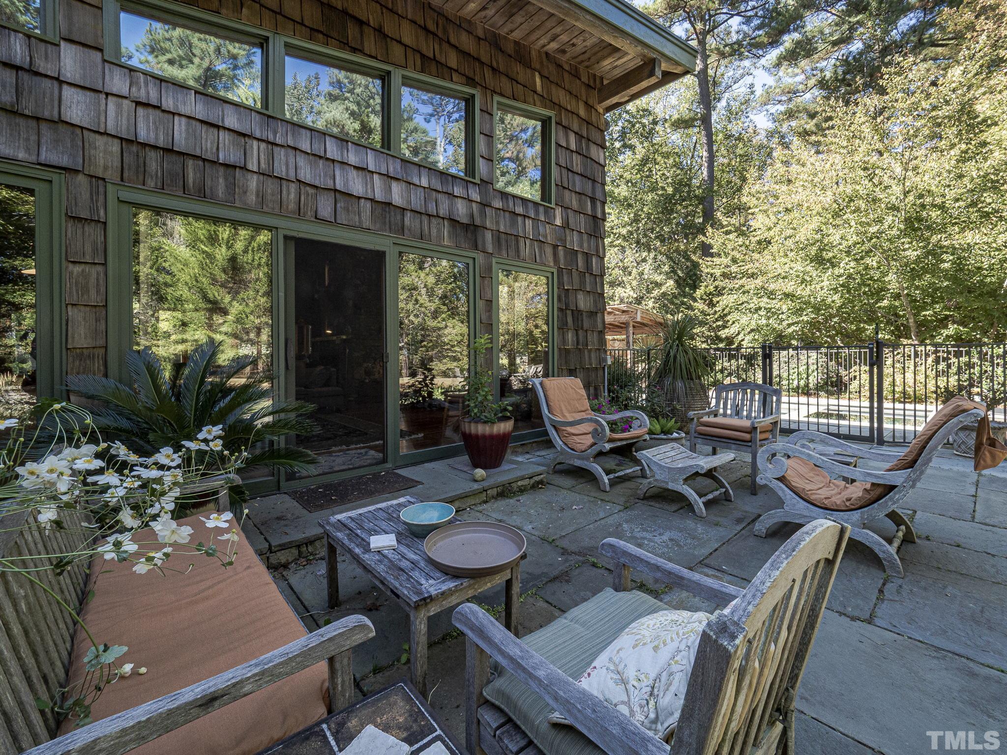 3916 Cole Mill Road Durham, NC 27712 - Photo 26 of 30 The patio space is essentially an extension of the home. Perfect for get togethers and parties...
