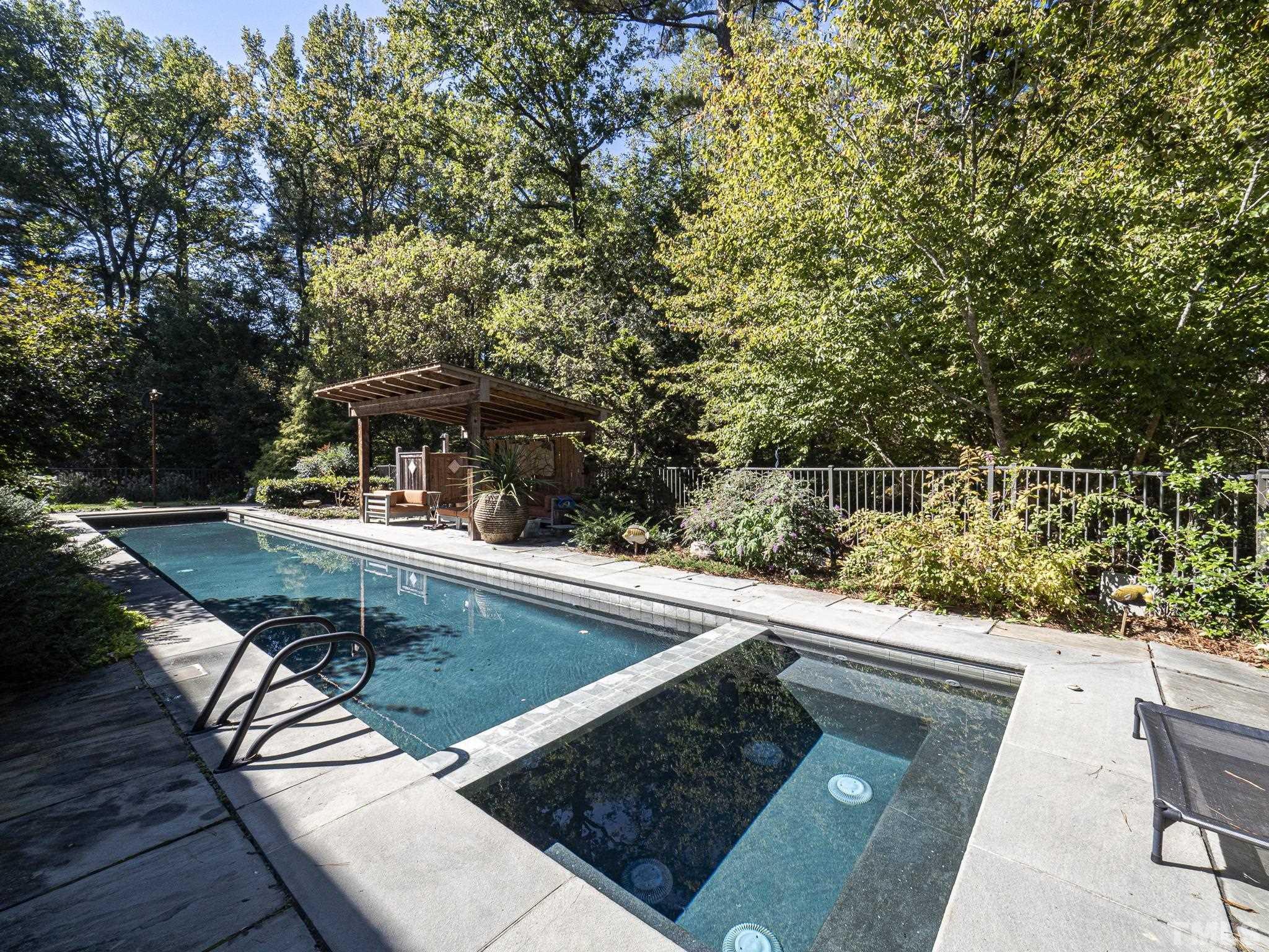 3916 Cole Mill Road Durham, NC 27712 - Photo 27 of 30 Beautiful saltwater pool that ties into its surroundings perfectly...