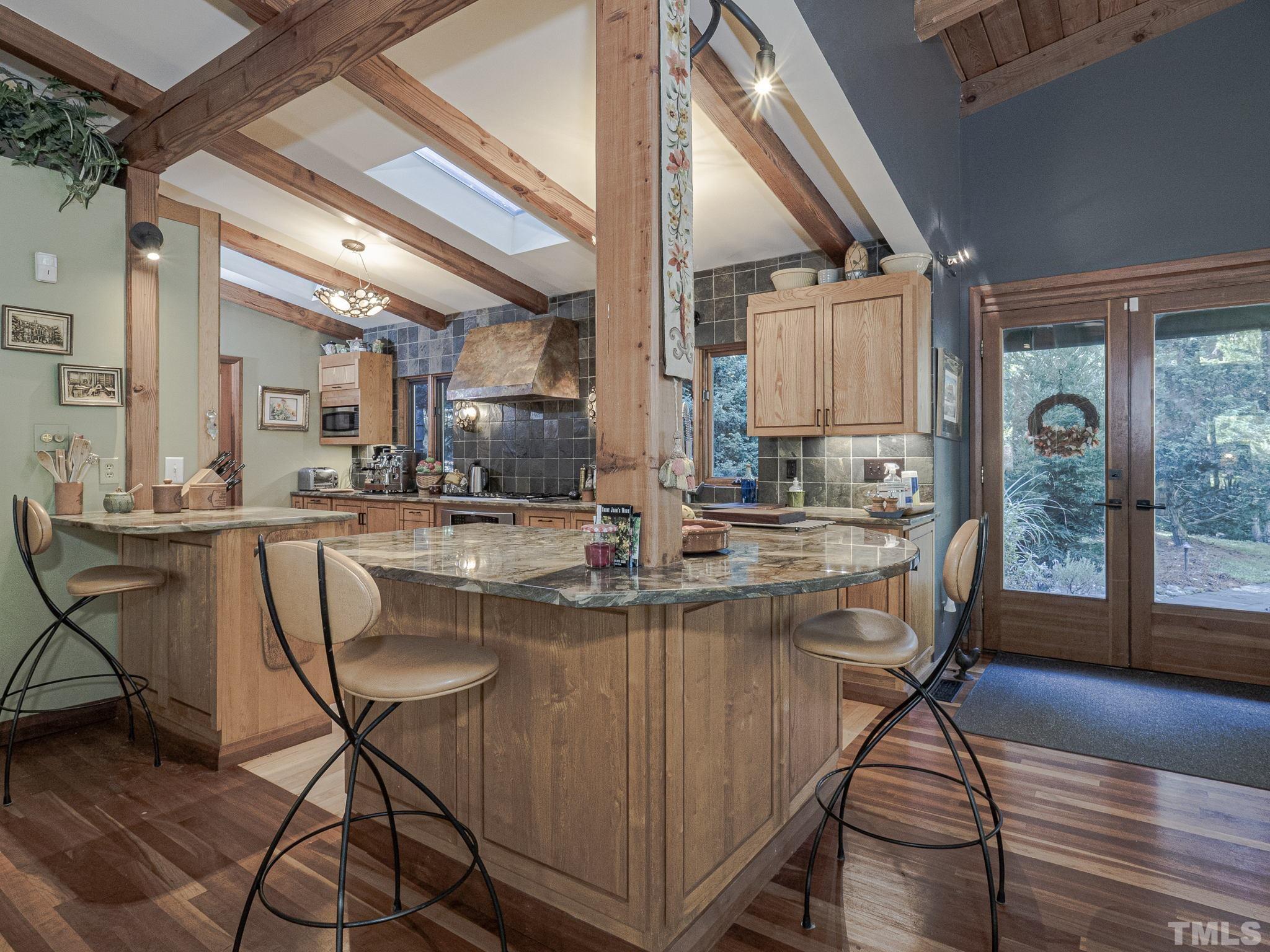 Huge open kitchen with quartzite countertops.