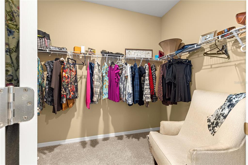 6365 Southwest 88th Loop Ocala, FL 34476 - Photo 20 of 35 a view of walk in closet with clothes and shoes