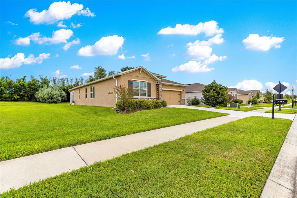 6365 Southwest 88th Loop Ocala, FL 34476 - Photo 3 of 35 a view of house with garden
