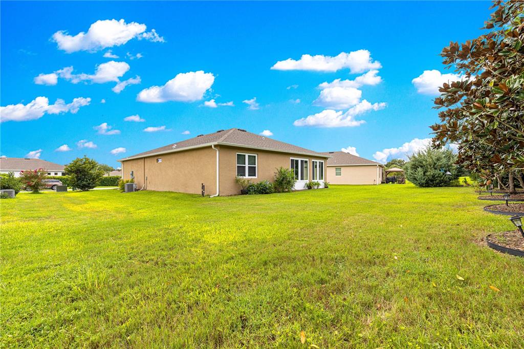 6365 Southwest 88th Loop Ocala, FL 34476 - Photo 4 of 35 a view of a house with yard and porch