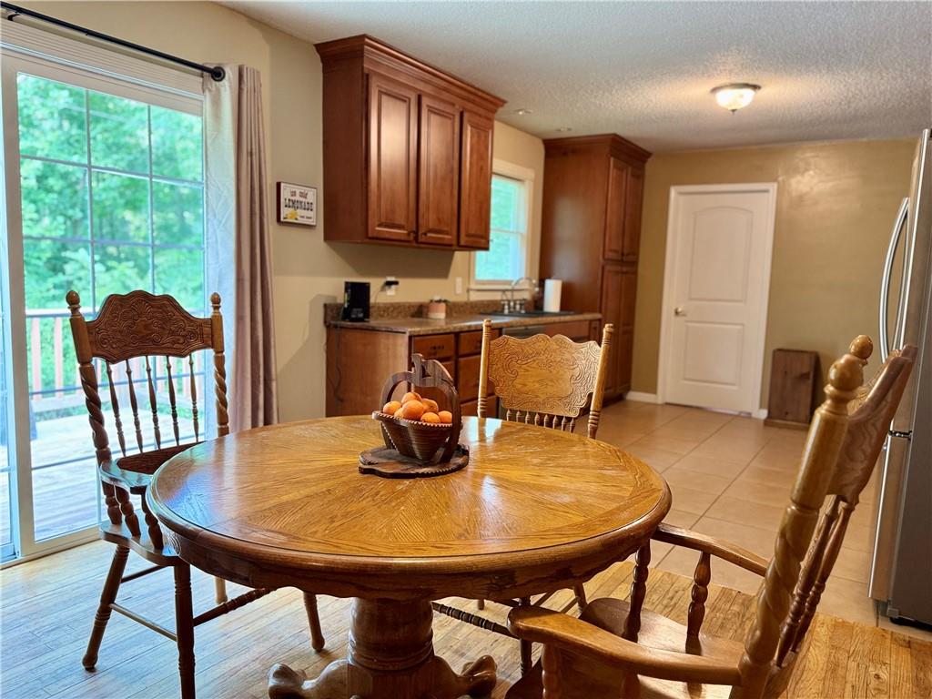 94 Big Jim Road Cleveland, GA 30528 - Photo 12 of 25 a view of a dining room with furniture