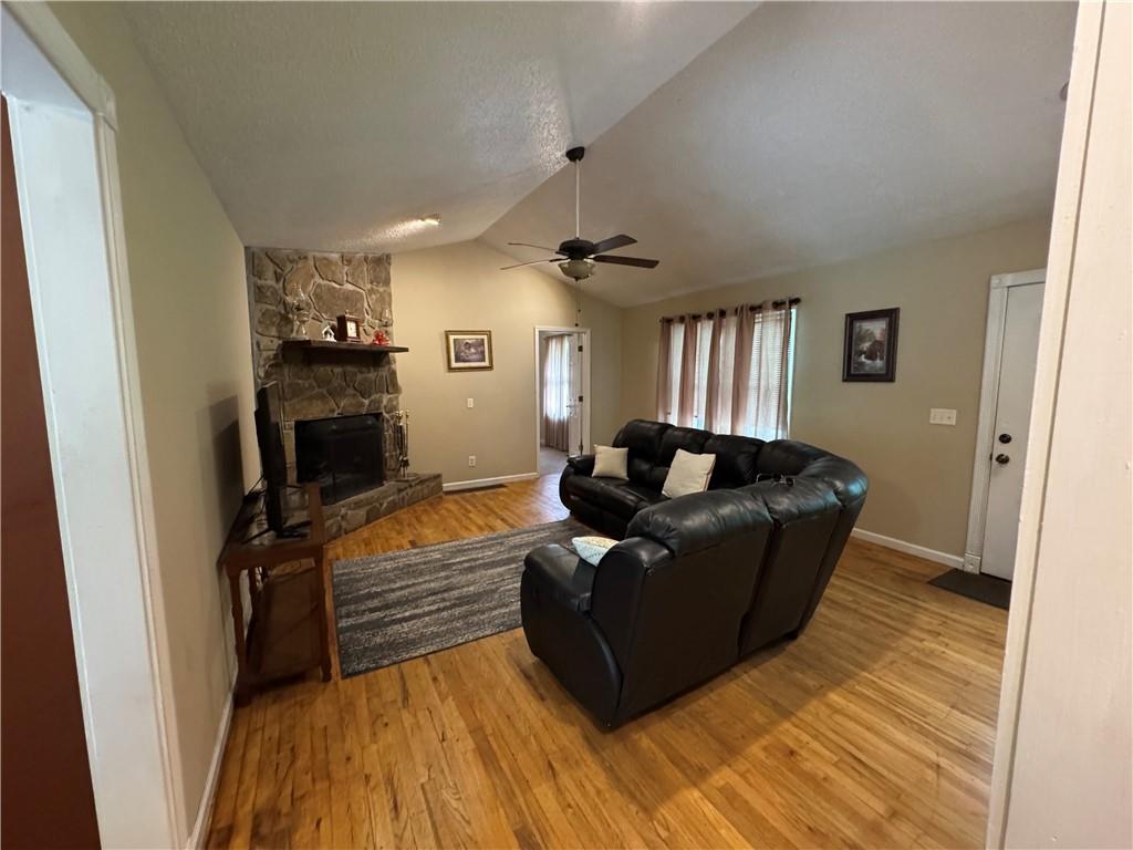 94 Big Jim Road Cleveland, GA 30528 - Photo 17 of 25 a living room with furniture and a flat screen tv