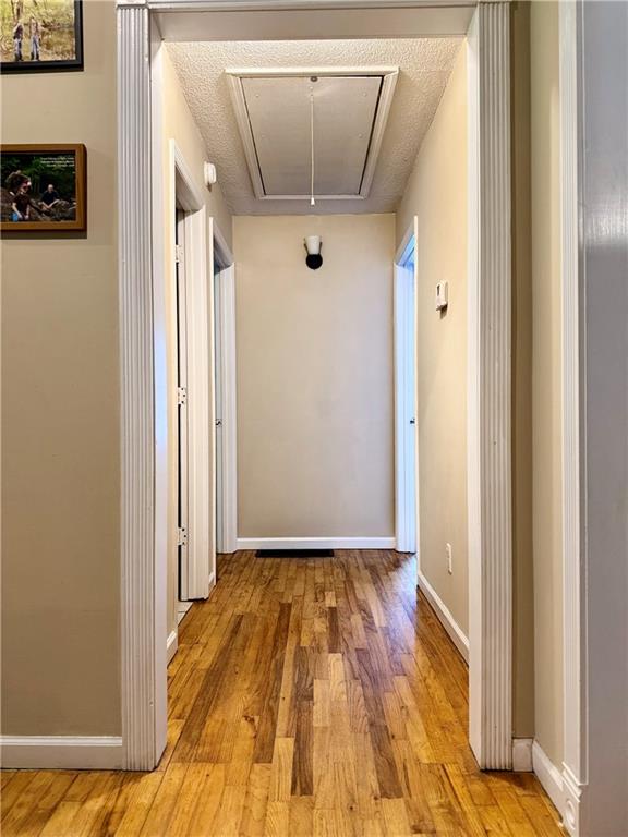 94 Big Jim Road Cleveland, GA 30528 - Photo 18 of 25 a view of a hallway with wooden floor