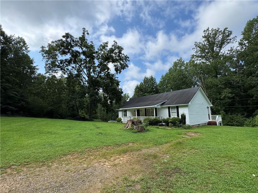 94 Big Jim Road Cleveland, GA 30528 - Photo 2 of 25 a view of house with yard and entertaining space