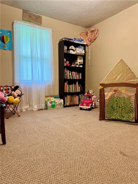 94 Big Jim Road Cleveland, GA 30528 - Photo 21 of 25 a room with toys and dresser