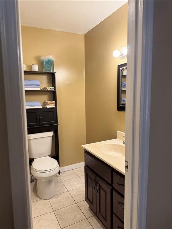 94 Big Jim Road Cleveland, GA 30528 - Photo 9 of 25 a bathroom with a sink a toilet and a mirror