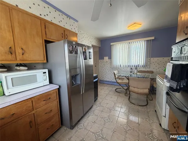a view of a balcony with wooden floor