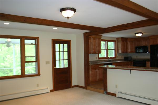 7 Brown Road Harvard, MA 01451 - Photo 13 of 22 wooden floor in an empty room with a window