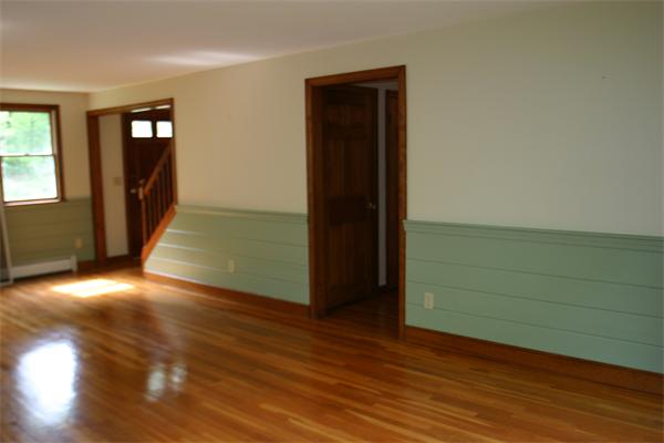7 Brown Road Harvard, MA 01451 - Photo 15 of 22 an empty room with wooden floor and windows