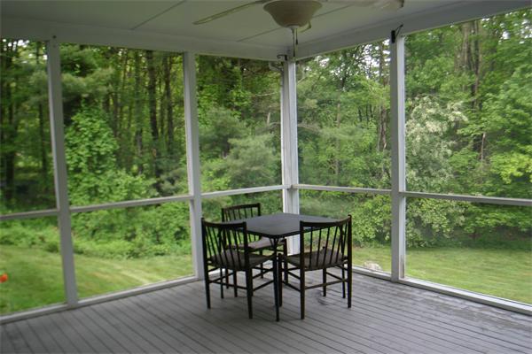 7 Brown Road Harvard, MA 01451 - Photo 5 of 22 a view of a porch with furniture and wooden floor