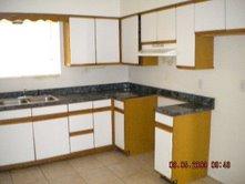 4728 East Apollo Road Phoenix, AZ 85042 - Photo 2 of 7 Kitchen with Diswasher, Tiles, Vent Hood