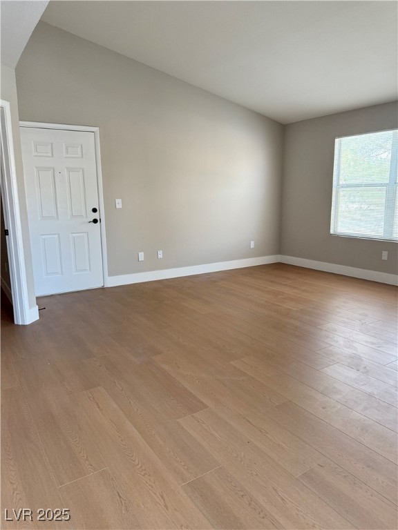1150 North Buffalo Drive, Unit 2025 Las Vegas, NV 89128 - Photo 5 of 20 Unfurnished room featuring light wood-style flooring