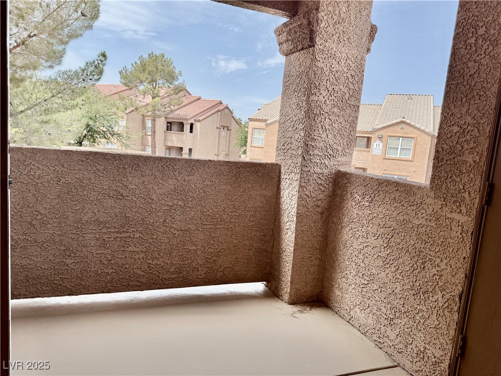 1150 North Buffalo Drive, Unit 2025 Las Vegas, NV 89128 - Photo 9 of 20 Patio / terrace featuring a residential view
