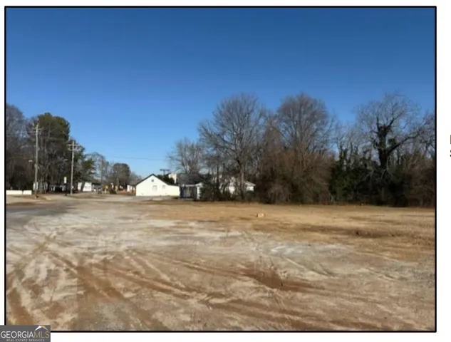 a view of empty space and trees
