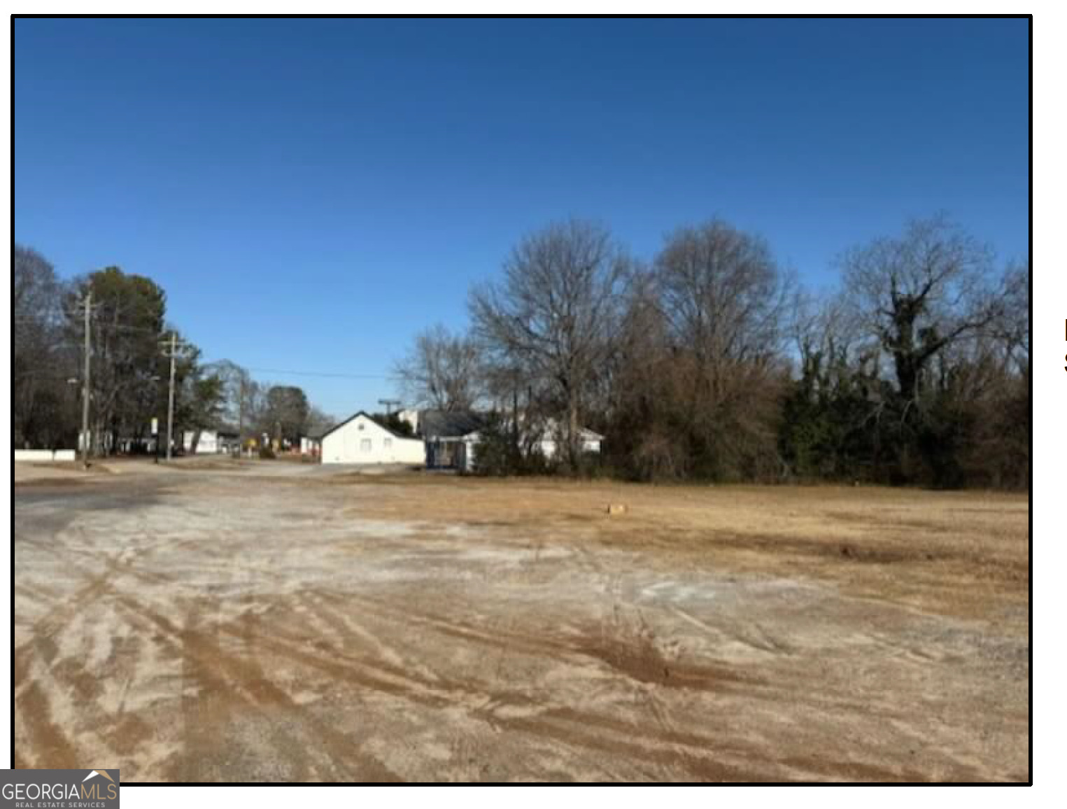 a view of empty space and trees