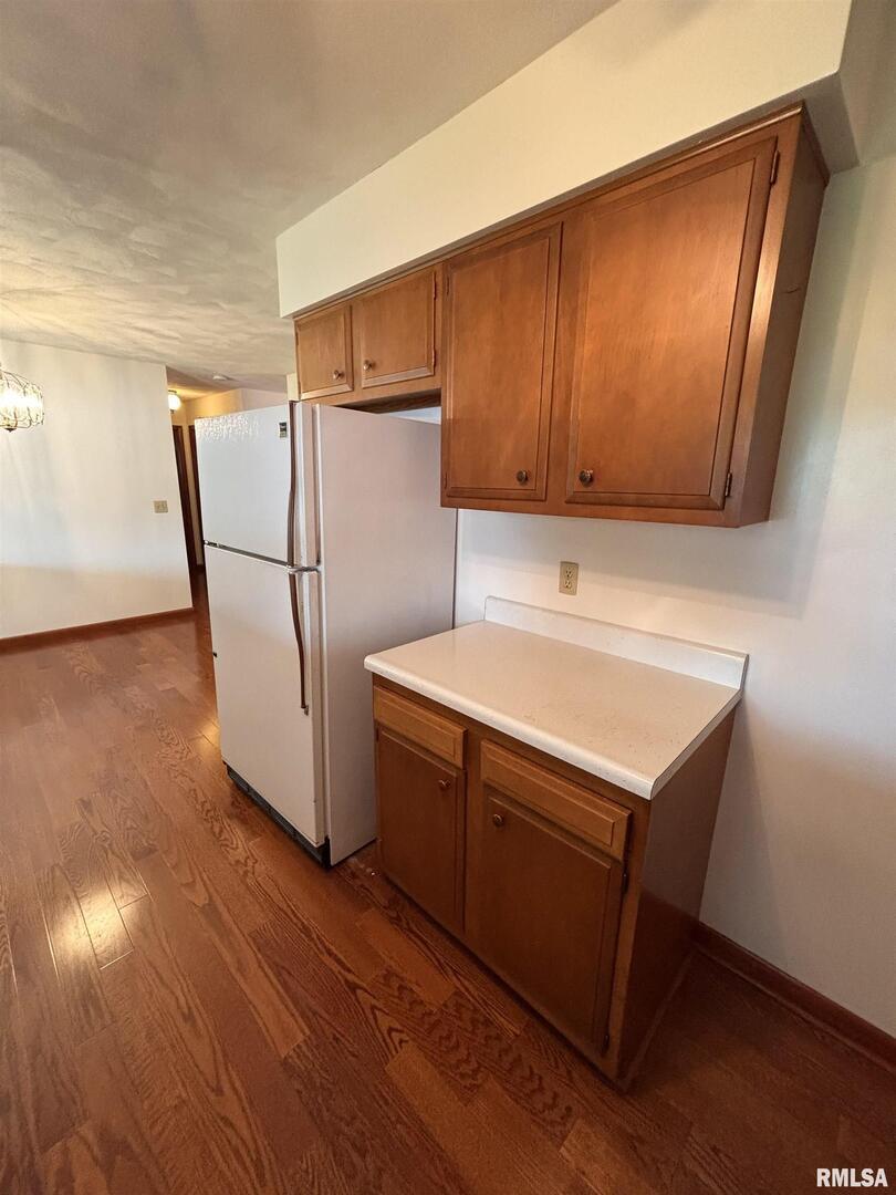 630 Mission Drive Kewanee, IL 61443 - Photo 20 of 57 a utility room with wooden floor washer and dryer