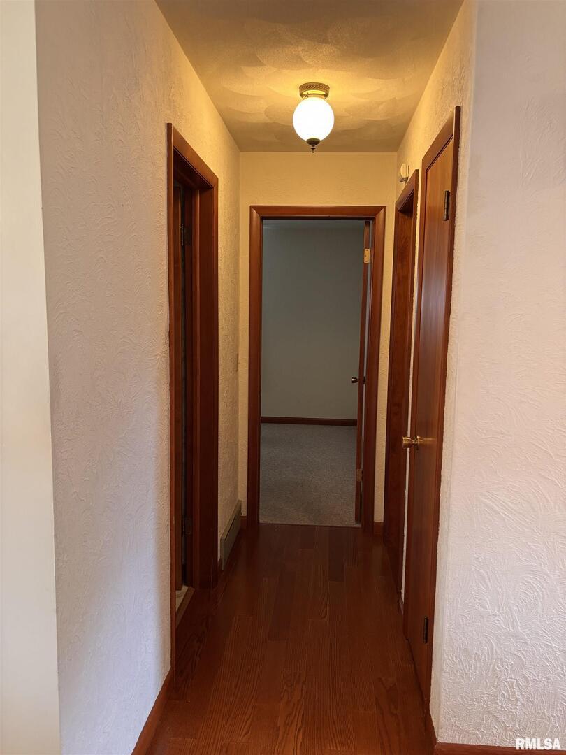 630 Mission Drive Kewanee, IL 61443 - Photo 31 of 57 a view of a hallway with wooden floor