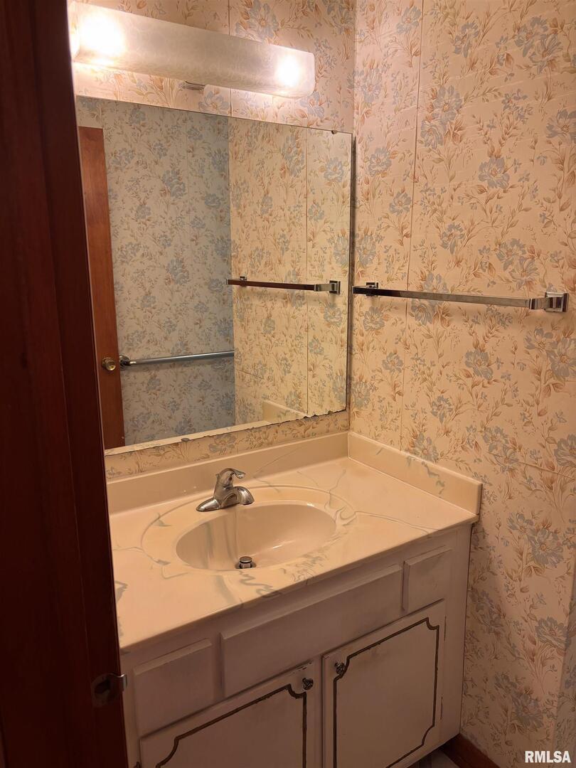 630 Mission Drive Kewanee, IL 61443 - Photo 43 of 57 a bathroom with a sink and a shower