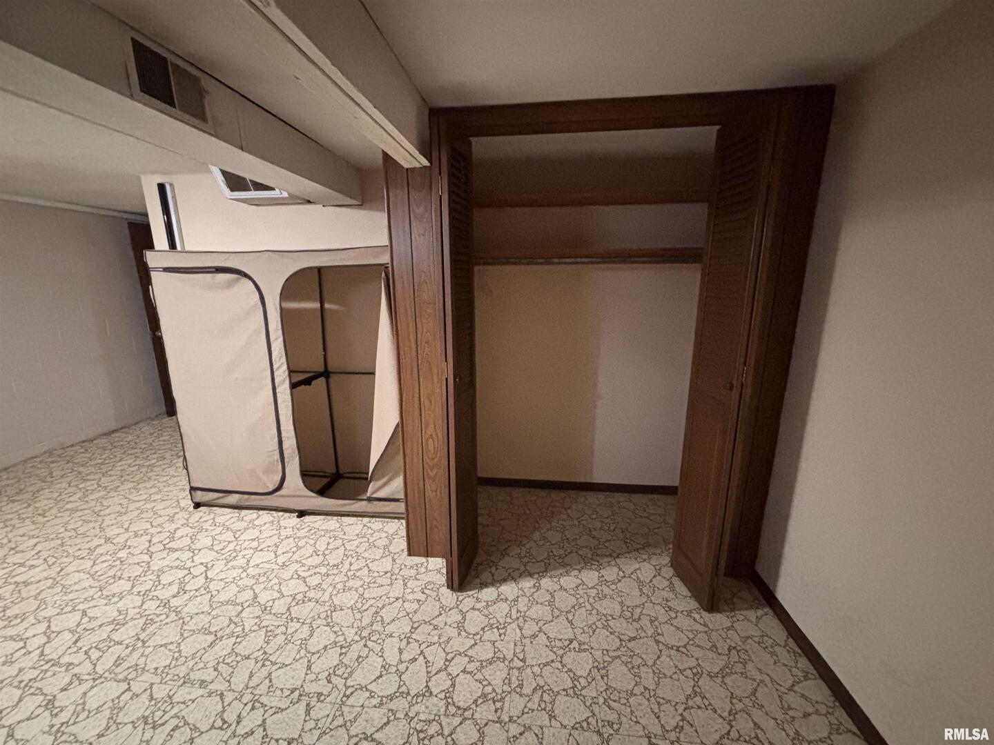 630 Mission Drive Kewanee, IL 61443 - Photo 49 of 57 a view of a storage room with a washer and dryer