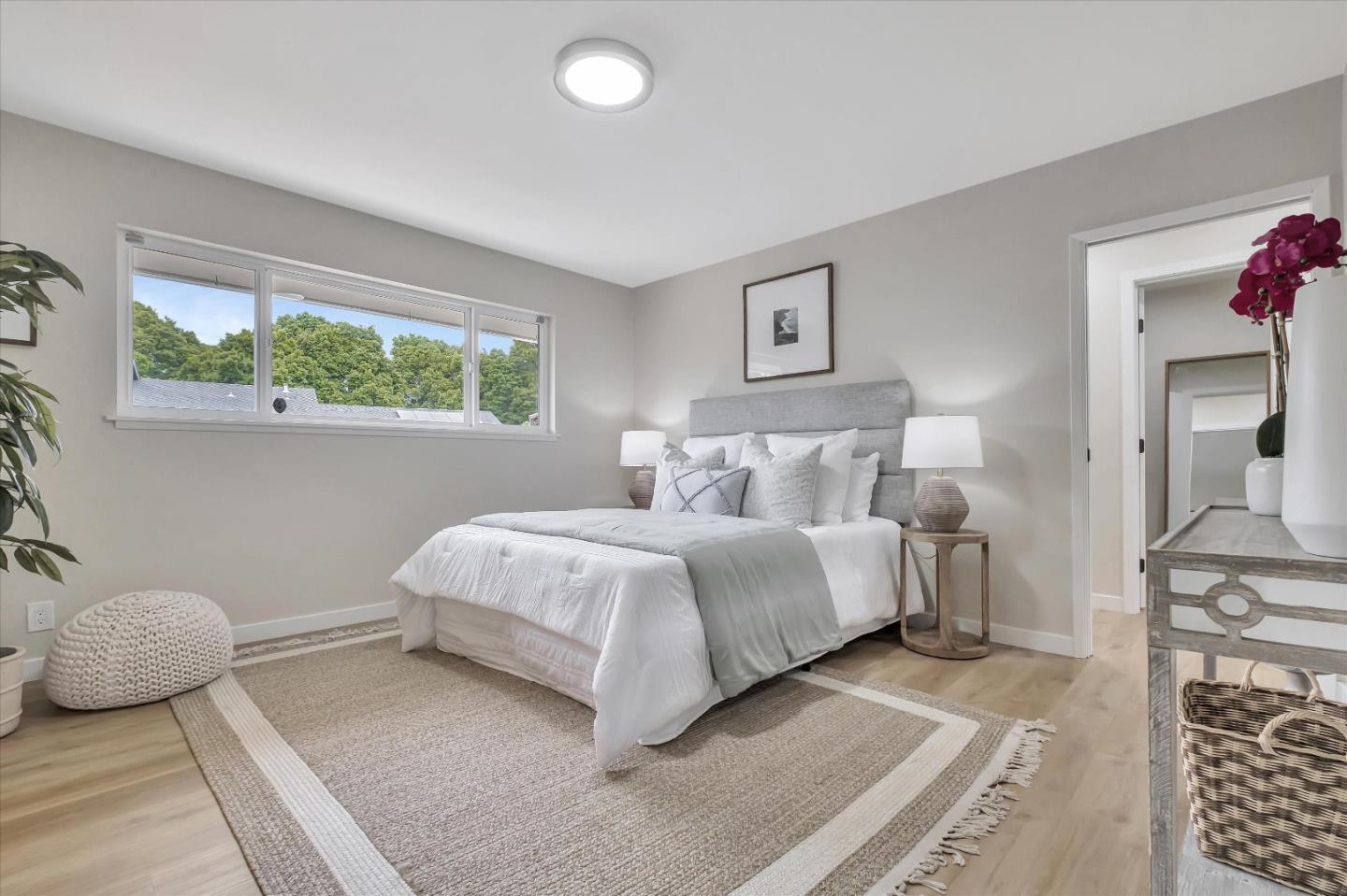 3400 Haas Drive Aptos, CA 95003 - Photo 19 of 35 a bedroom with a bed and a chair