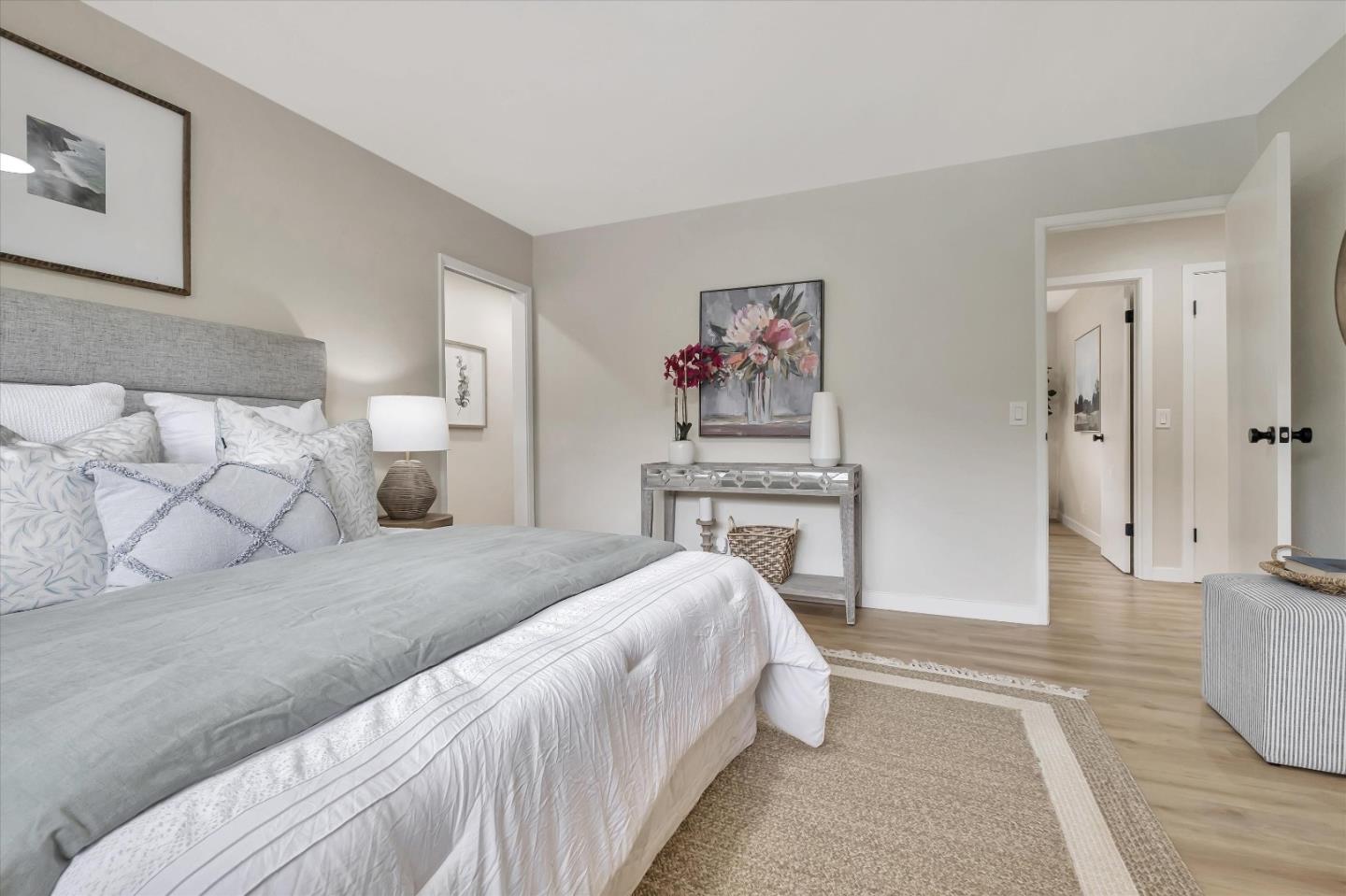 3400 Haas Drive Aptos, CA 95003 - Photo 20 of 35 a spacious bedroom with a bed and a cabinets