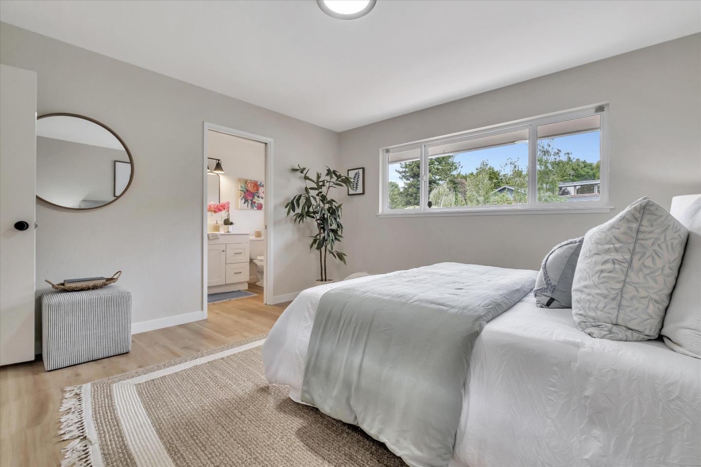 3400 Haas Drive Aptos, CA 95003 - Photo 21 of 35 a bedroom with a bed and a large window