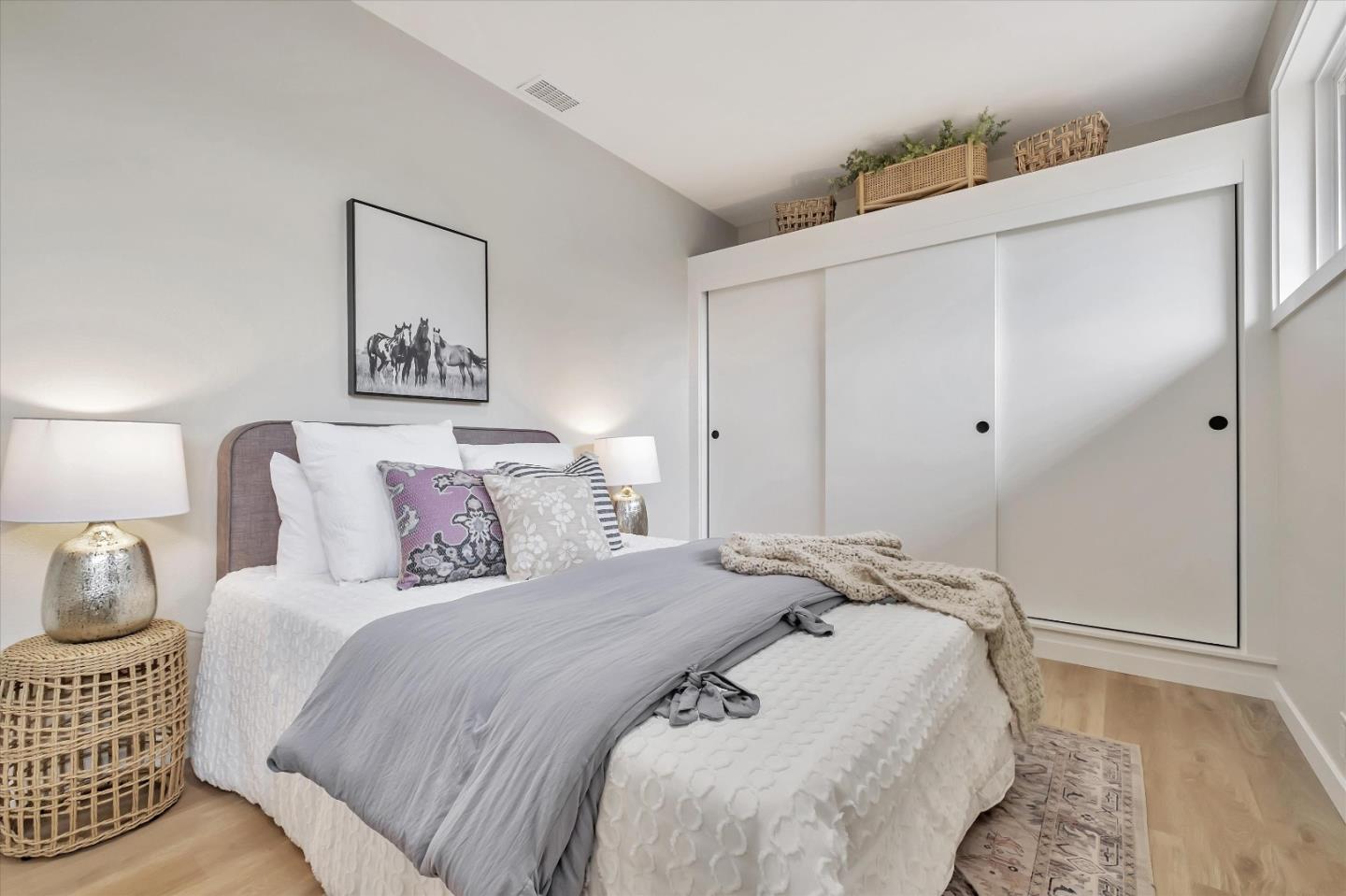 3400 Haas Drive Aptos, CA 95003 - Photo 23 of 35 a spacious bedroom with a bed and a couch